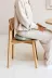 PPV-02.36PE_HiRes_PNG_RGB_VLUV_PIL+PED_SOVA_Pesto_Mood_Sitting on chair_01